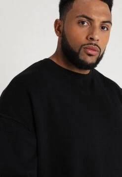 URBAN CLASSICS Oversized Open Edge Crew- Sweater - Schwarz 13 URBAN CLASSICS Oversized Open Edge Crew- Sweater - Schwarz -Urban Classics 74b9c57bdc9744e8a443a9c994db6e65
